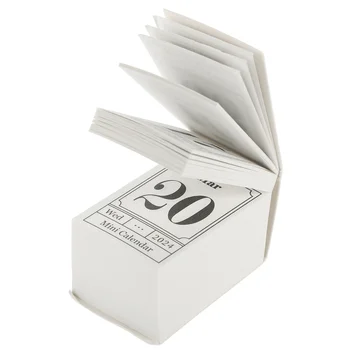 Мини-отрывной календарь Украсит рабочий стол на 2024 год, стоящий на бумажной столешнице.